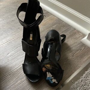 Report Signature stiletto cuff platform sandal